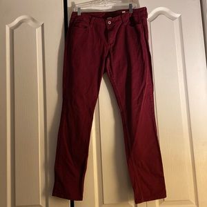 All burgundy skinny jeans. Good fit.